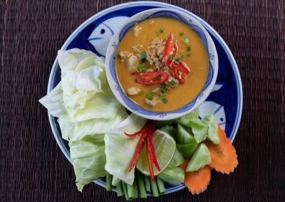 prahok katis dipping sauce for a plate full of fresh vegetables